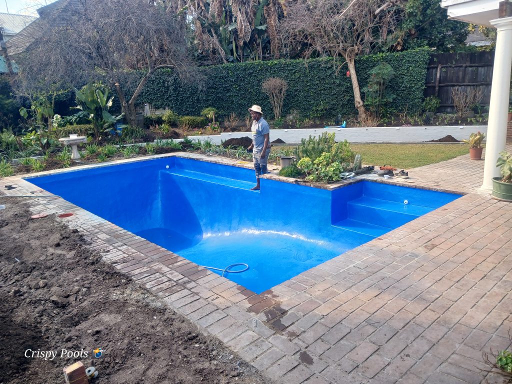 Crispy-pools-strong-blue-fiberglass-lining-pool-resurfacing-jgp