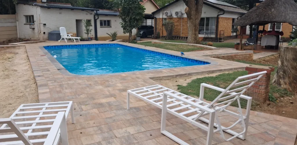 smooth-modern-finish repaired-structural-issues-upgraded-pool systems-refreshed-outdoor-appearance-crispy-pools-before-image-jpg