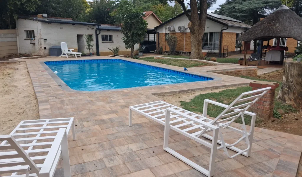 smooth-modern-finish repaired-structural-issues-upgraded-pool systems-refreshed-outdoor-appearance-crispy-pools-before-image-jpg